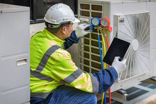 Professional Hvac technician working in Burlington, ND